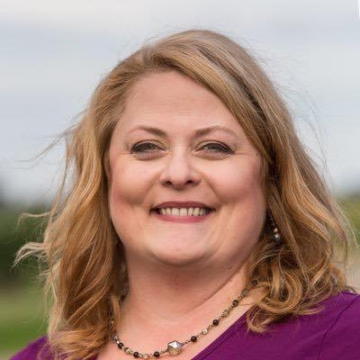 Stacey Lilja smiling at the camera