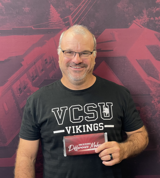 Tony Wendel holding award