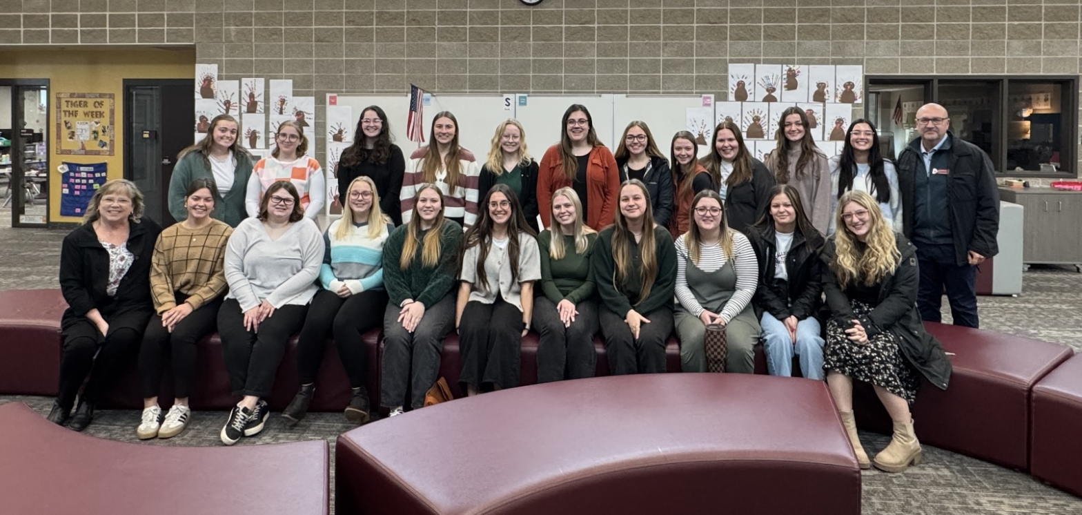 Student group smiling at the camera