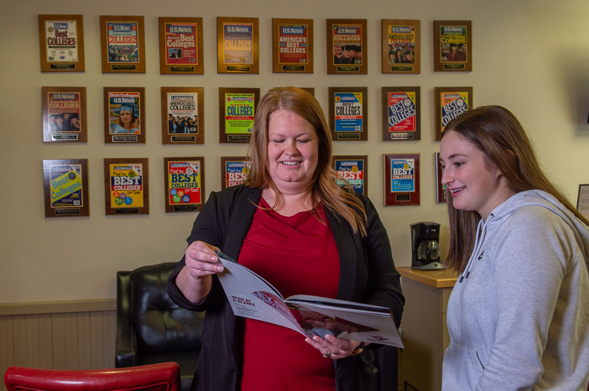 VCSU staff work with a prospective student