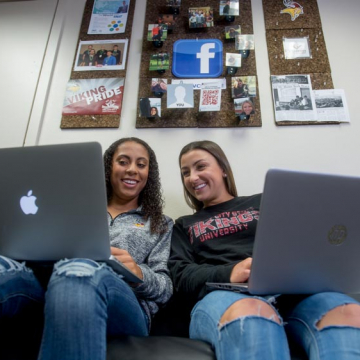 Students sitting in dormitory