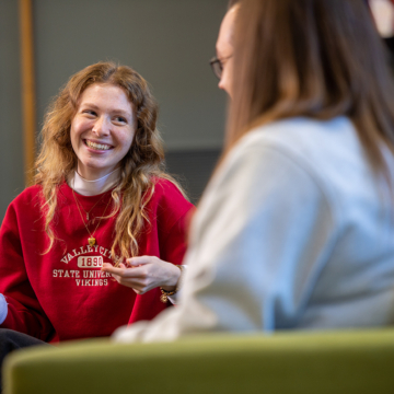 female students talking to each other