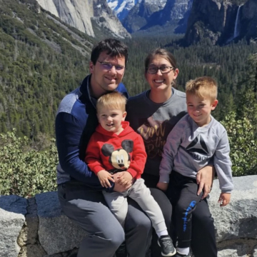 Brittany Evans with her husband Josh and two children. Mountains in background