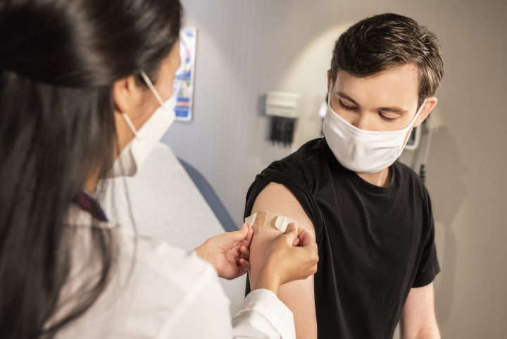 man receiving vaccine