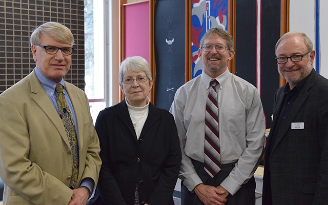 Among the guests recognizing Margaret Dahlberg (second from left) for her service as VCSU interim president were Larry Skogen, president, Bismarck State College; Larry Brooks, associate dean for academic affairs, Dakota College at Bottineau; and Phil Wisecup, vice chancellor of strategy and strategic engagement, North Dakota University System.