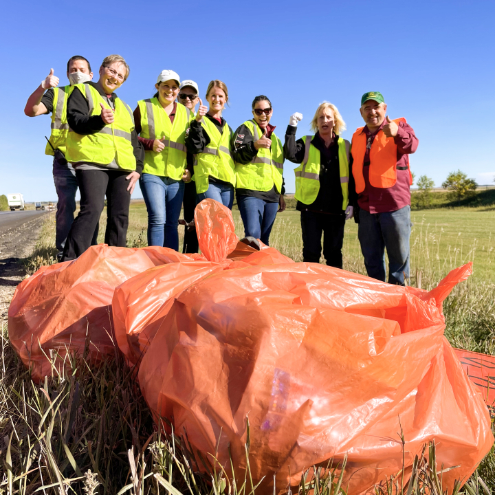 staff members participating in highway cleanup