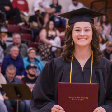 Clarissa Schlottman receiving degree