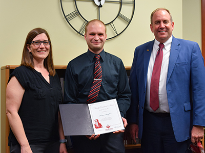 Kenton Sandfoss receiving award