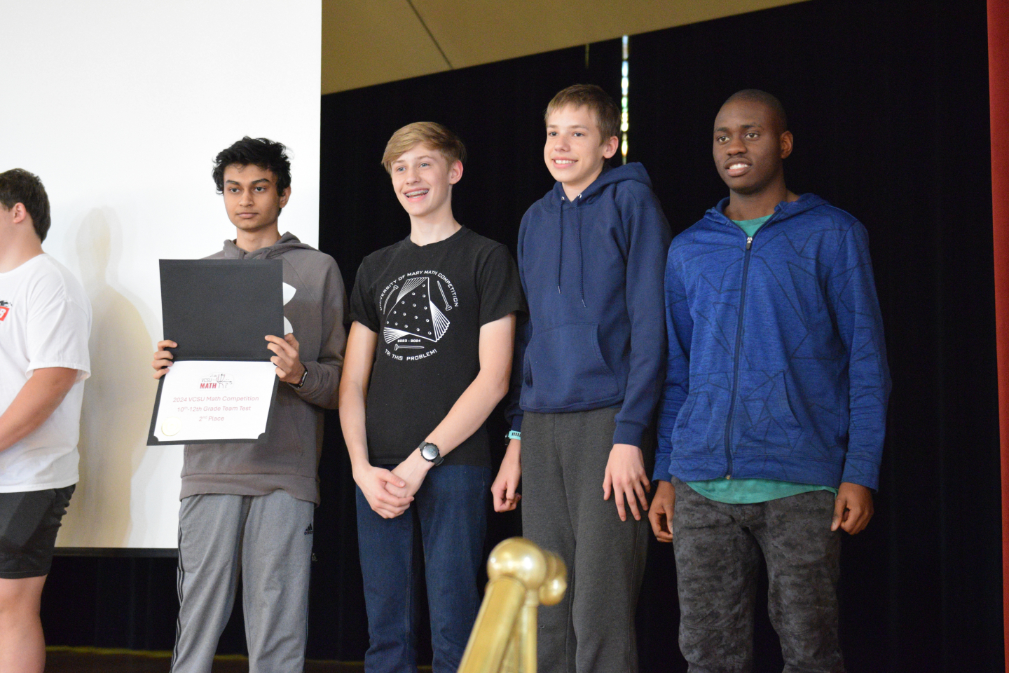 4 students hold a certificate