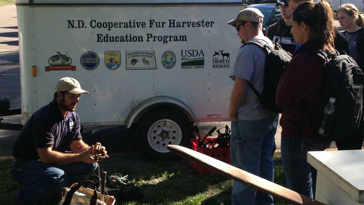 Mammalogy students learning about the role that trapping and furbearer management plays in wildlife conservation